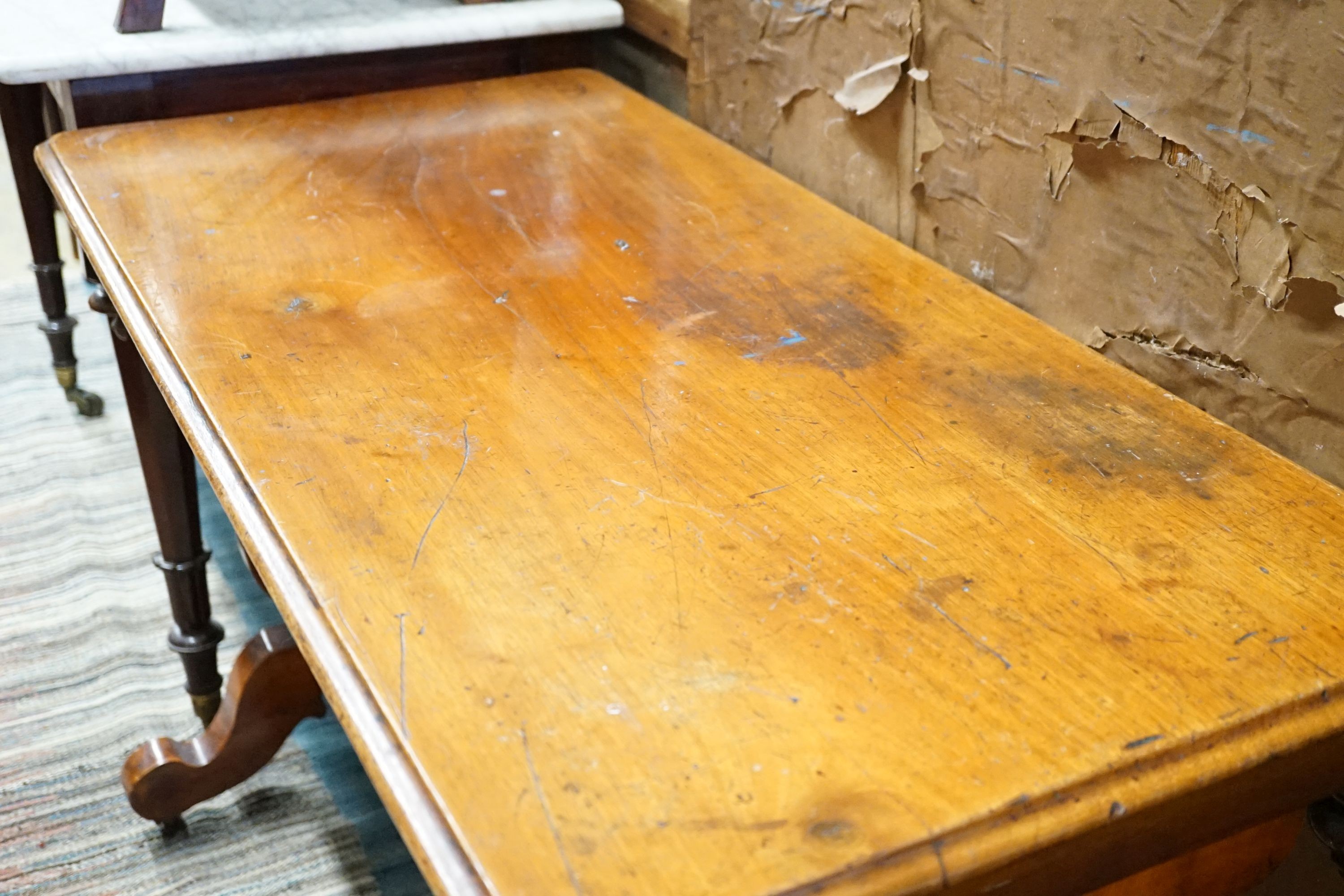 A late Victorian mahogany centre table, width 106cm, height 71cm and a Victorian mahogany centre table with associated broken marble top, width 109cm, height 56cm